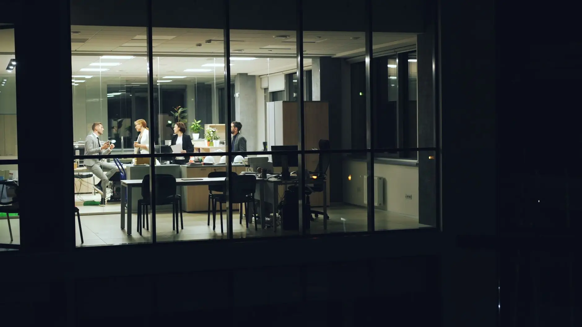 night office meeting viewed from outside